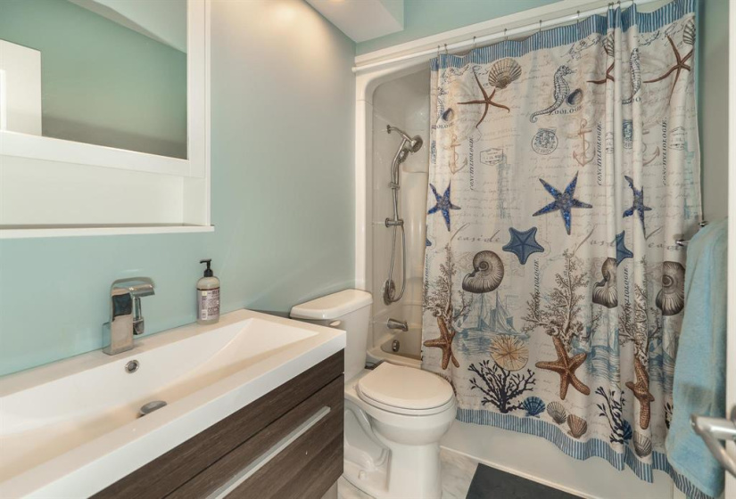 4 piece bath on the main with floating vanity