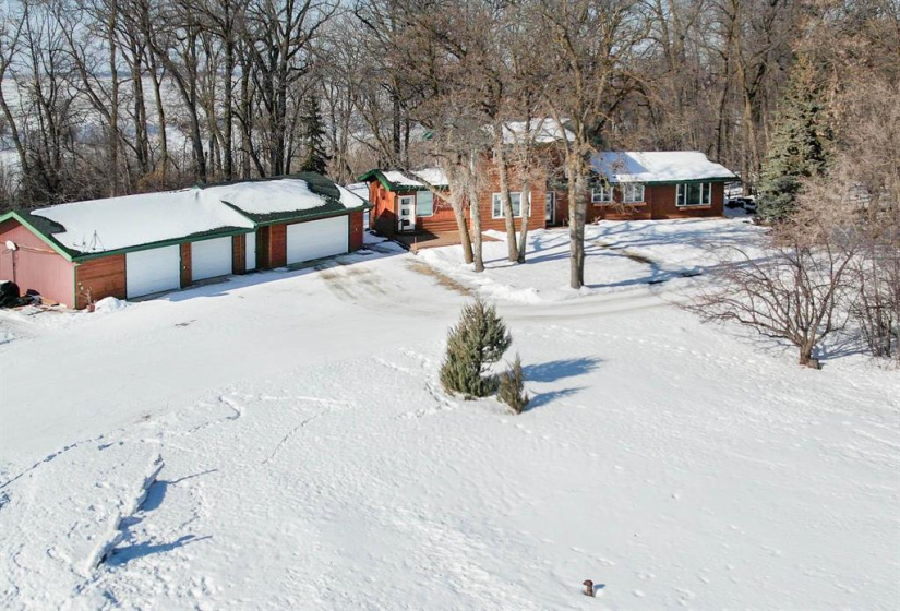 The original home of 2307 sf showing five car garage!