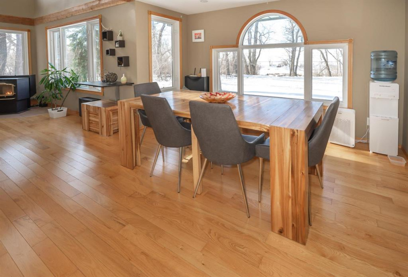 Dining room with huge windows overlooking the river.