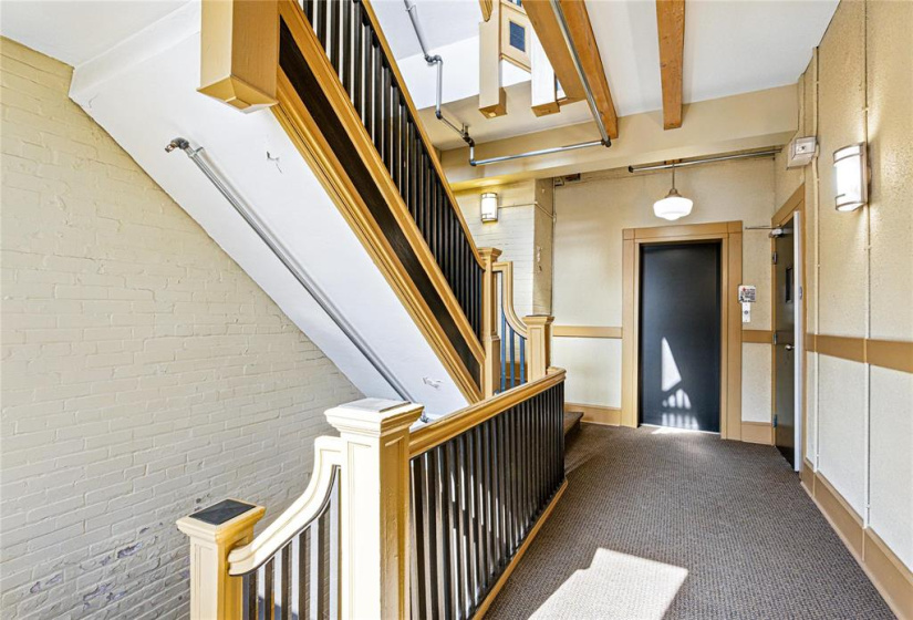 Fourth floor elevator and unit nearby