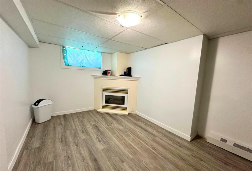 basement recroom with gas fire place not working and turned off