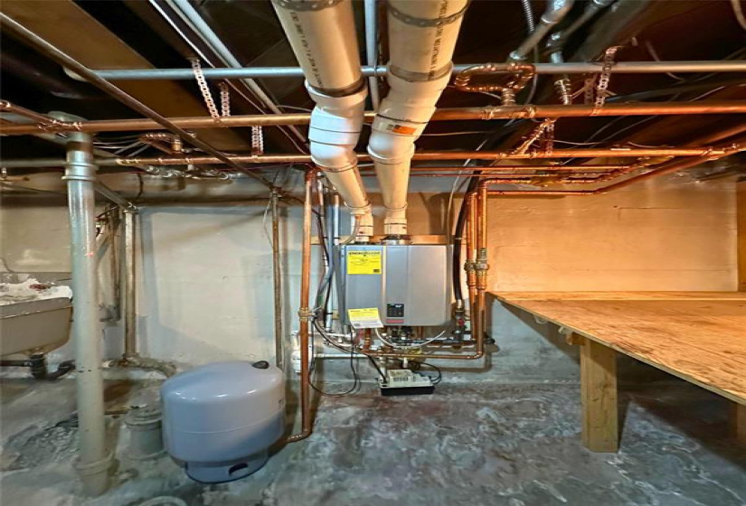 tankless hot water heater and boiler system for heating the home does both functions