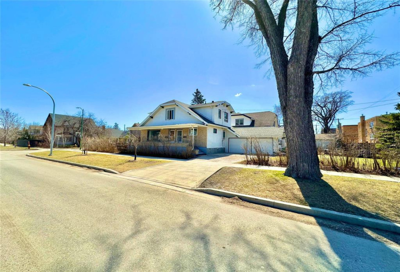 Double attached garage with large paved driveway