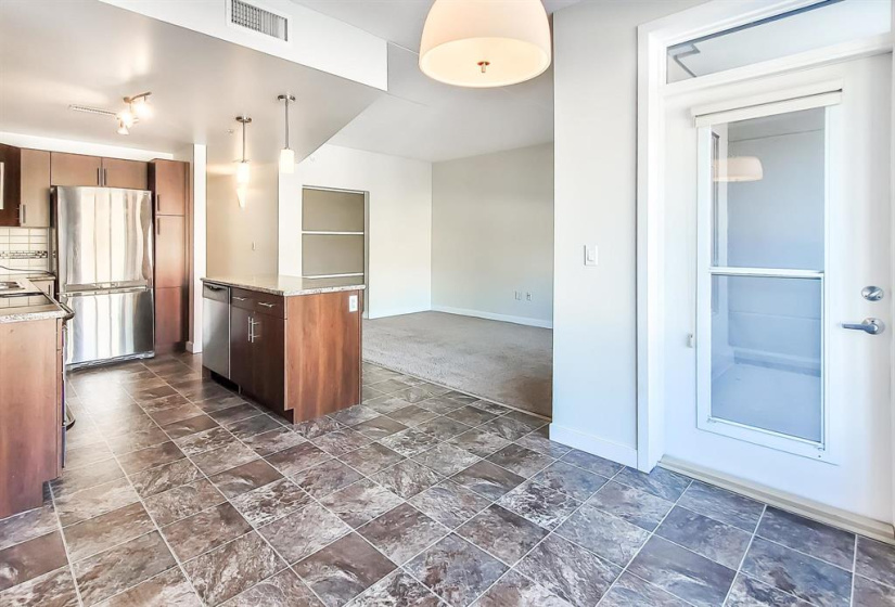 Dinette area has door to your balcony