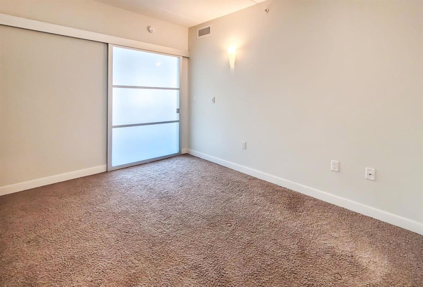 Br has a frosted sliding door for privacy