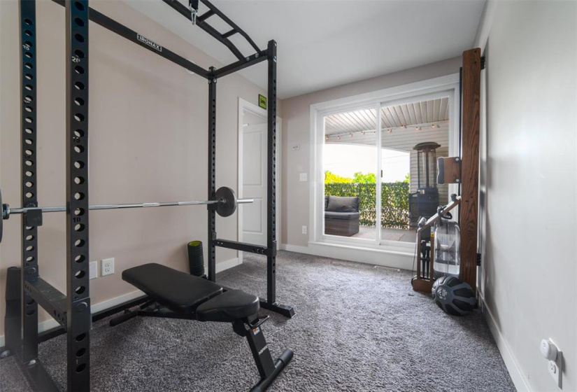 Third Floor Loft Area with Patio Doors to Balcony