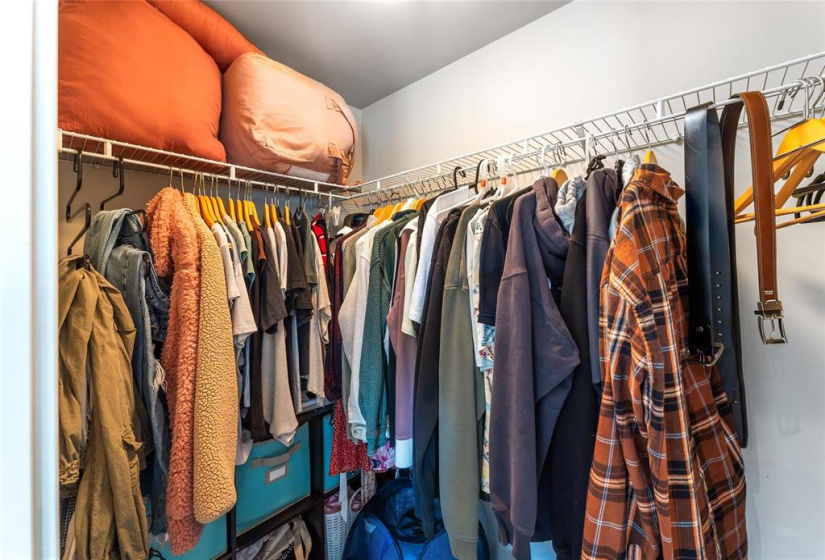 Walk in closet in primary bedroom