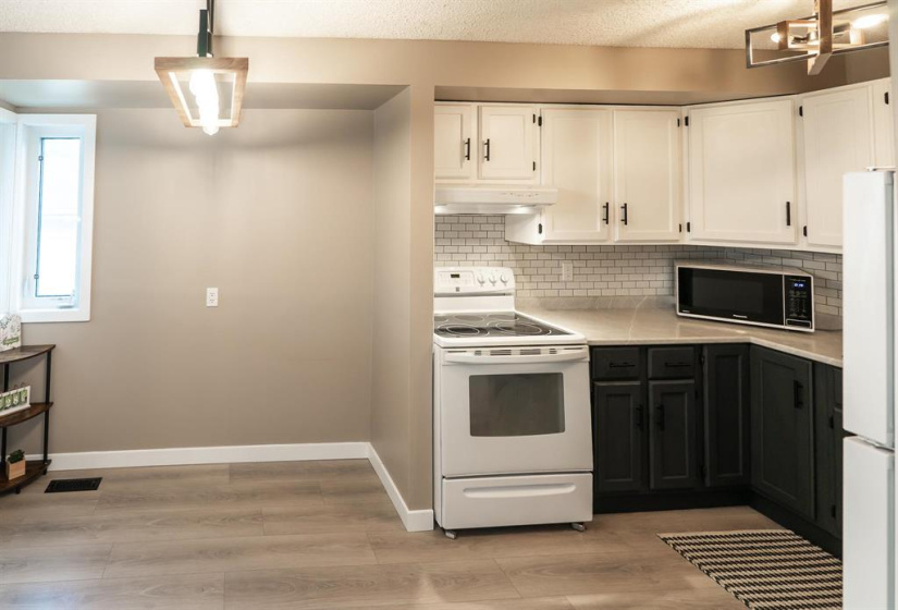Eating area is right next to the kitchen
