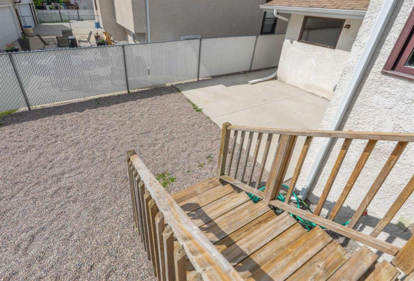 Gravel area at the bottom of the stairs