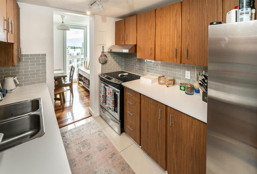 Galley kitchen harkens to mid-century modern days