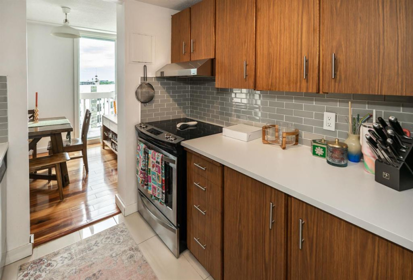 Stainless steel oven with hood fan, lots of counter space