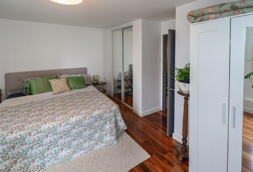 Double mirrored closet in the primary bedroom