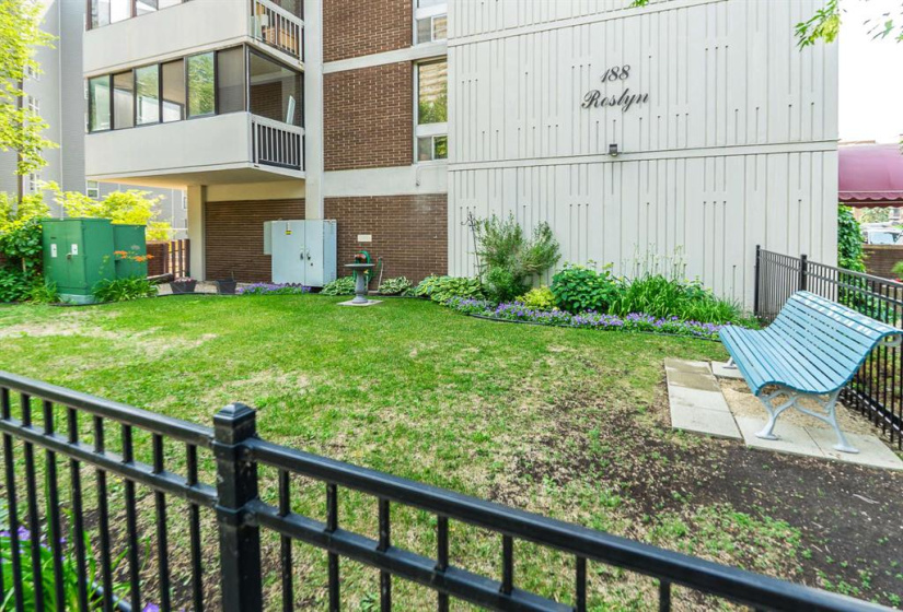 Charming fenced garden where the residents and their pets can mingle.