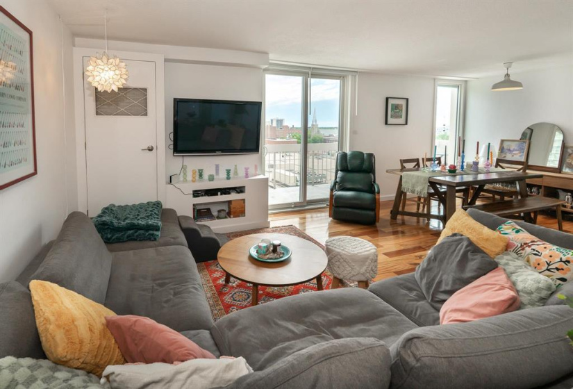 Large living room with lots of natural light