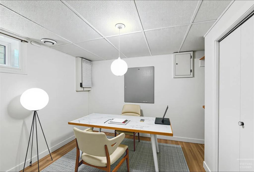 virtually staged: basement Bedroom (window may not meet egress standards of current building code)
