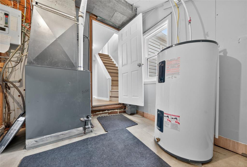 Utility room with laundry.