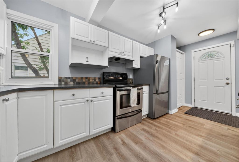 Front entrance into functional kitchen.