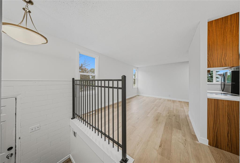 main floor to kitchen and living and dining room