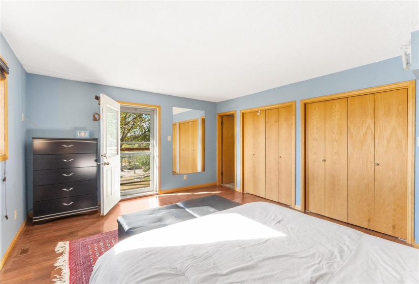 Double closets. Door to upper balcony