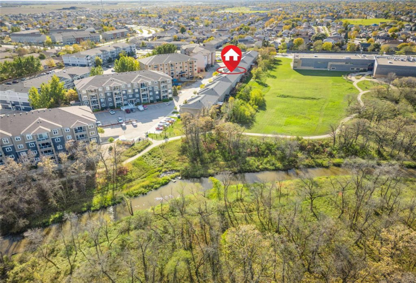 Great location. Look at all that greenspace behind this unit and walking paths along the Seine River