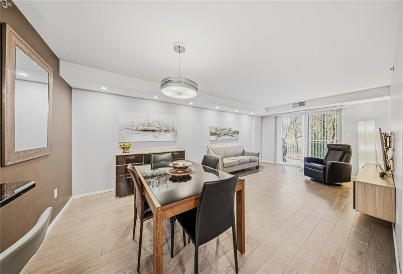 Dining area. Buffet hutch and TV mounted wall unit along with TV and Wall mount are included