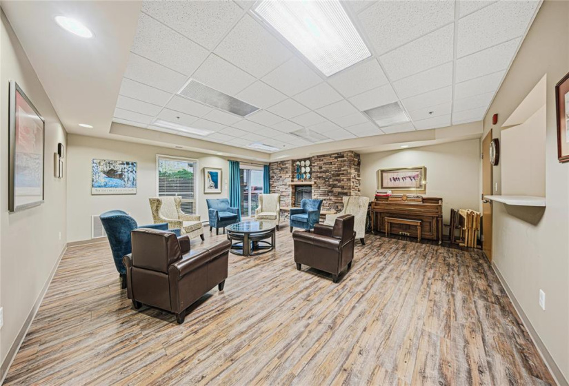 With fireplace and kitchen