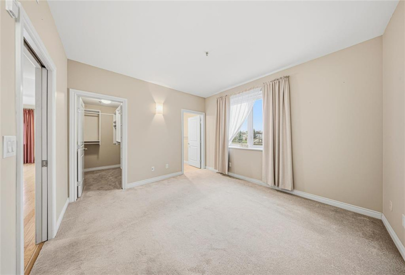 Primary bedroom with walk in closet and 3 piece ensuite