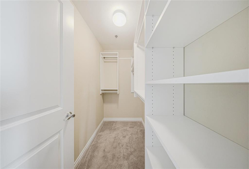 Closet in primary bedroom