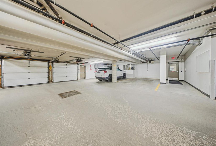 Prime Parking spot next to the door to the elevators.