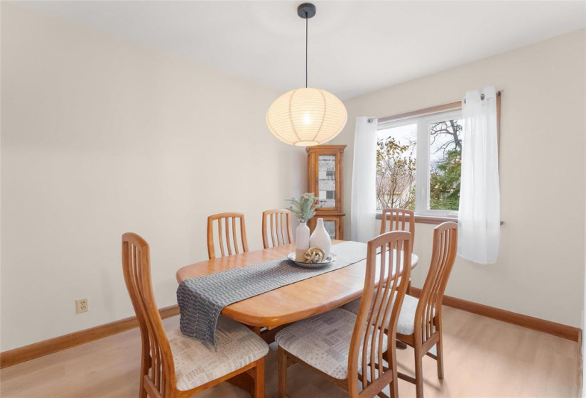 Formal dining room but could be another main floor bedroom.  New window, light and flooring.