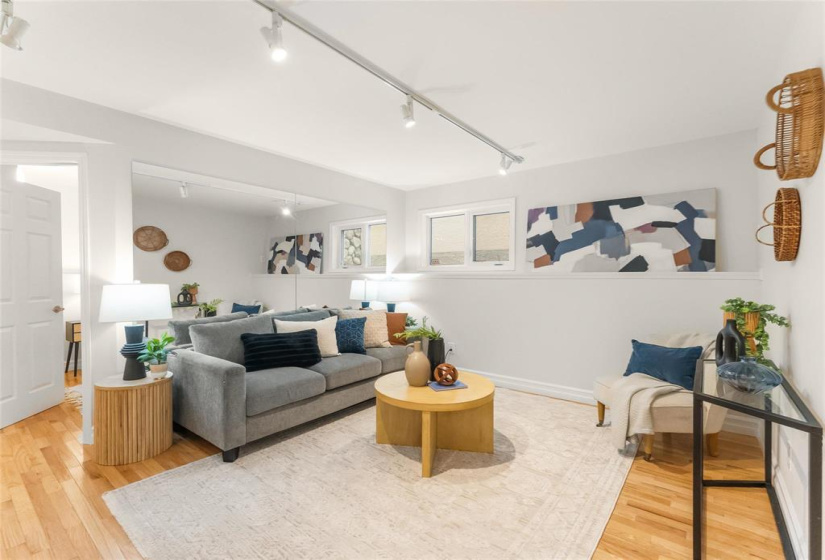 Rec room in lower level. Great windows. Oak hardwood floors. Wood structure floor with crawl space