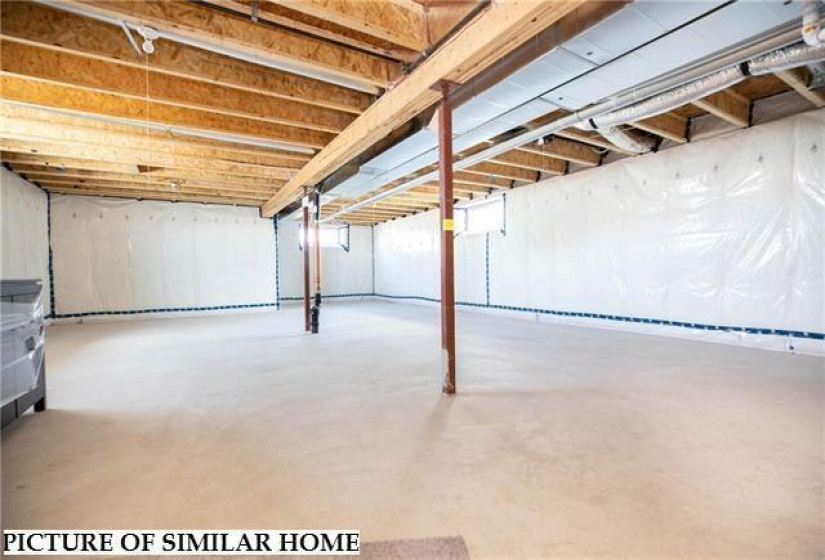 8ft high Bsmt ceiling w/engineered floor trusses & mirco-lam main beam.