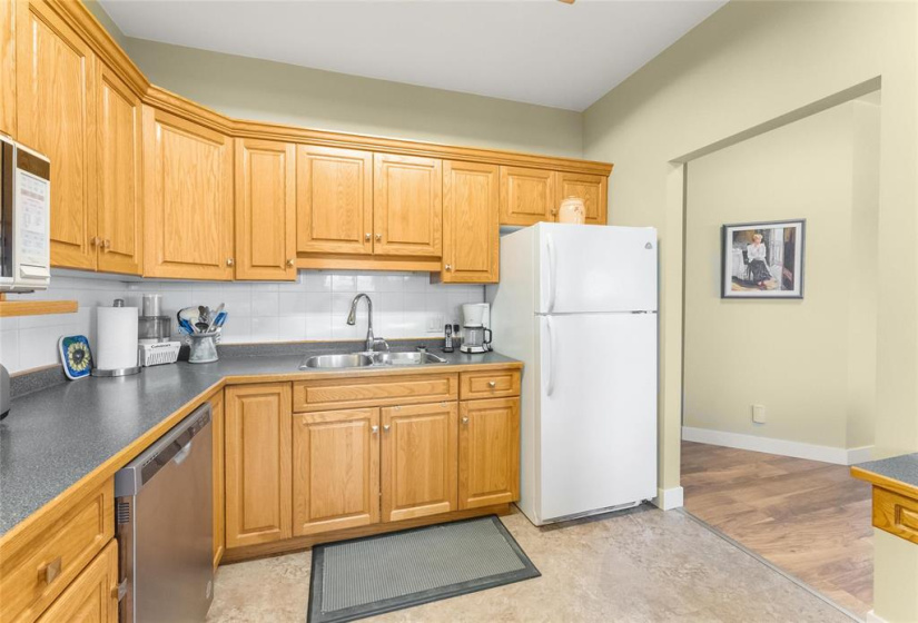 Fridge, stove, dishwasher included.  Double sinks.
