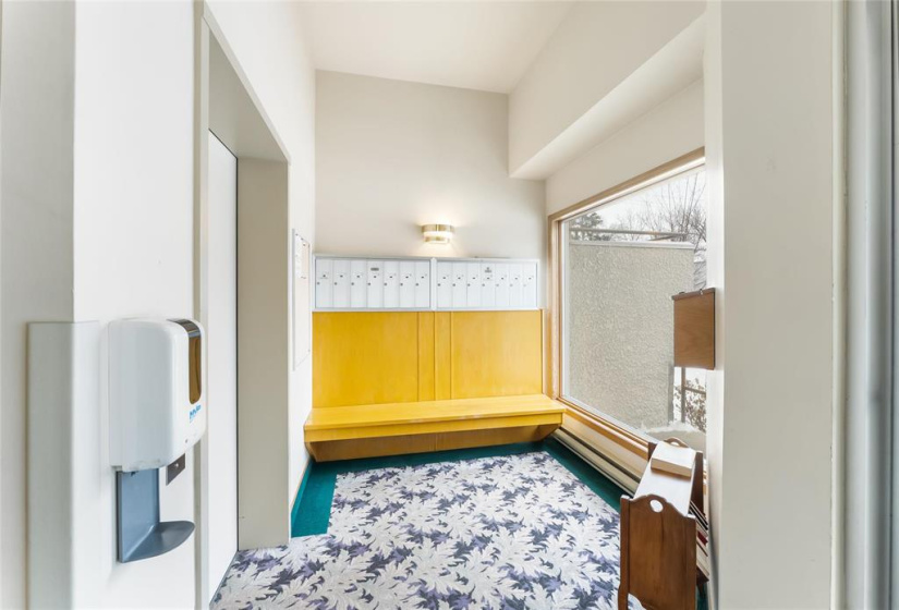 Main floor elevator and mail boxes