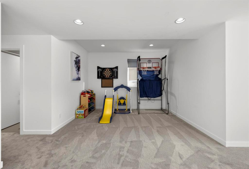 Toy area/games room in the basement