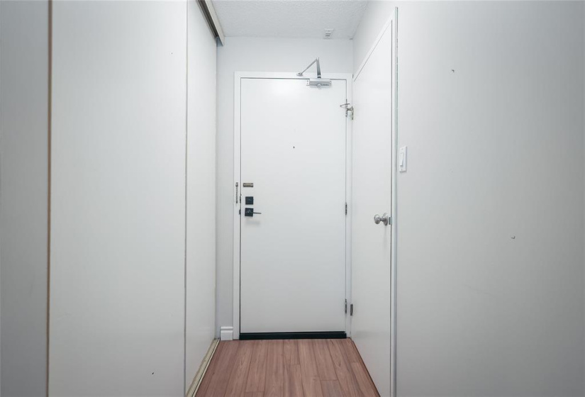 In-suite storage room & Front hall closet across from one another