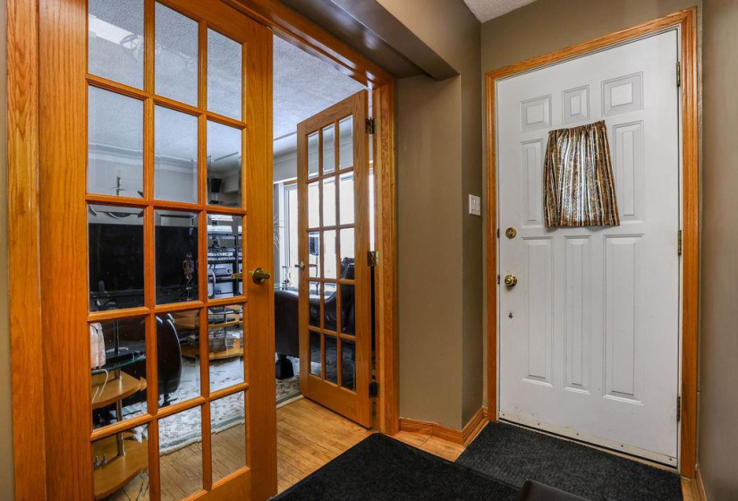 Beautiful French doors lead you into the living room.