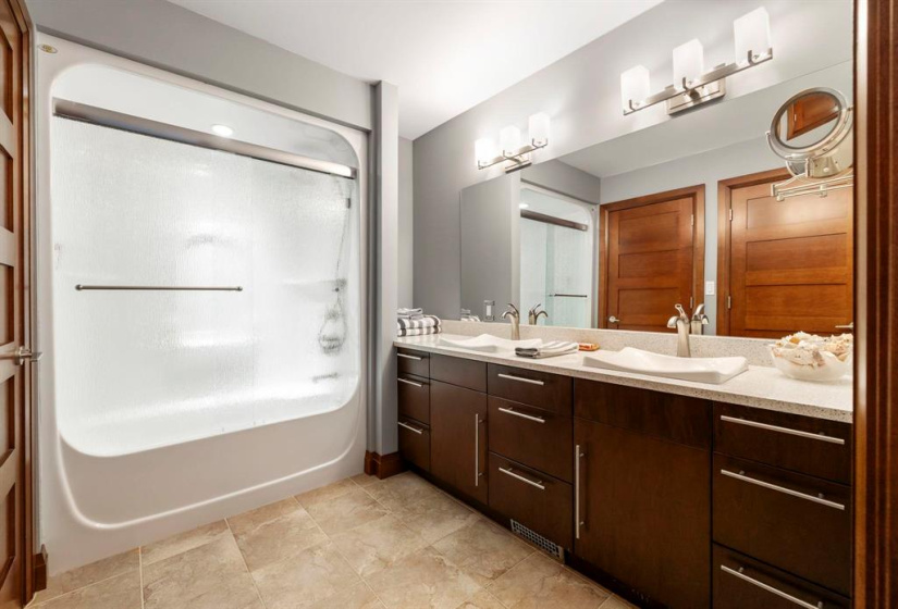 Jack and Jill bathroom on the upper level with heated floors