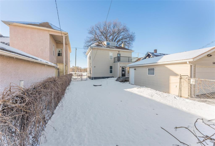 Side yard to back of home