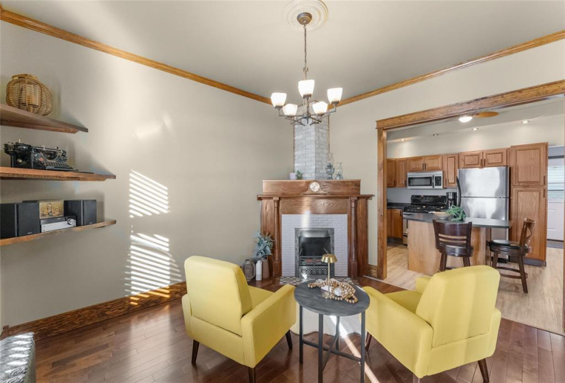 Curl up with a good book in this cozy sitting room with wood burning fireplace.