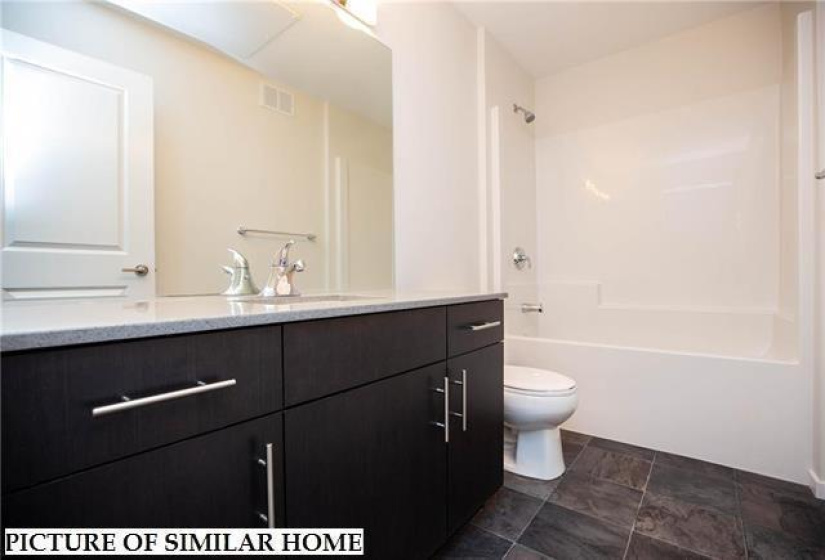 4 piece Main bath with quartz counters & undermount sink.