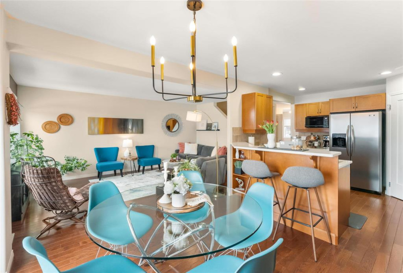 Dining area to living room and kitchen views