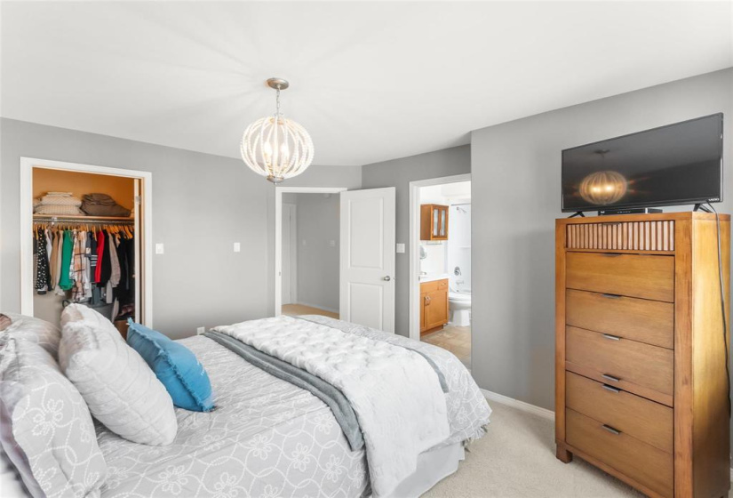 Second bedroom view to walk-in closet and 4 piece ensuite.