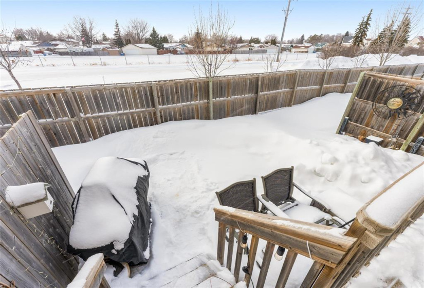 Back yard.  No immediate back neighbors. Greenspace behind the fence. Great for playing catch or taking your dog for a walk
