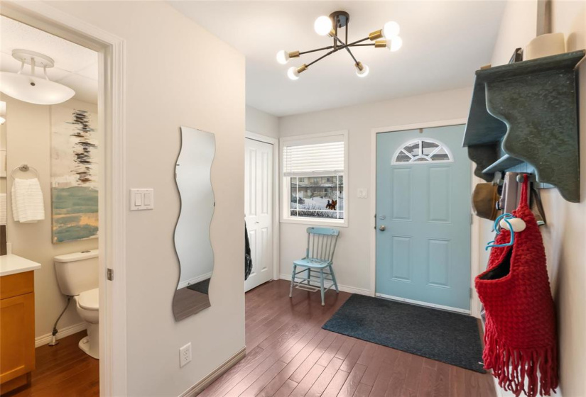 Spacious front entrance and powder room