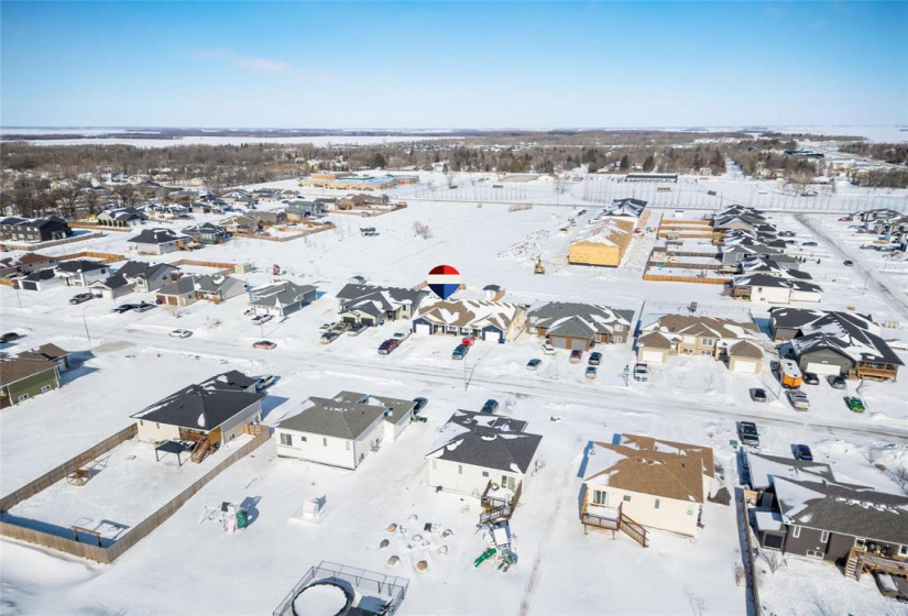 Walking path behind the home with small park/picnic area and walking distance to the school.