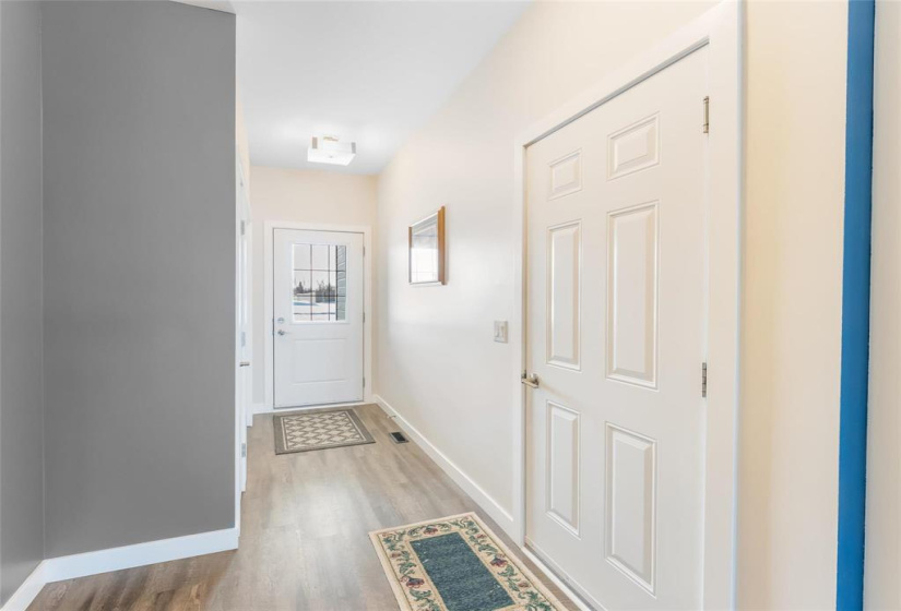 Front entrance with door to garage