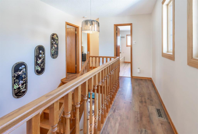 Upper hall - primary bedroom is located away from the other 2 bedrooms