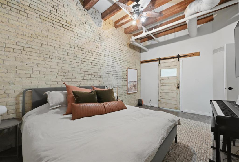Bedroom with beautiful brick