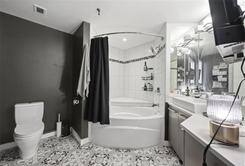 Bathroom with beautiful tiled floor